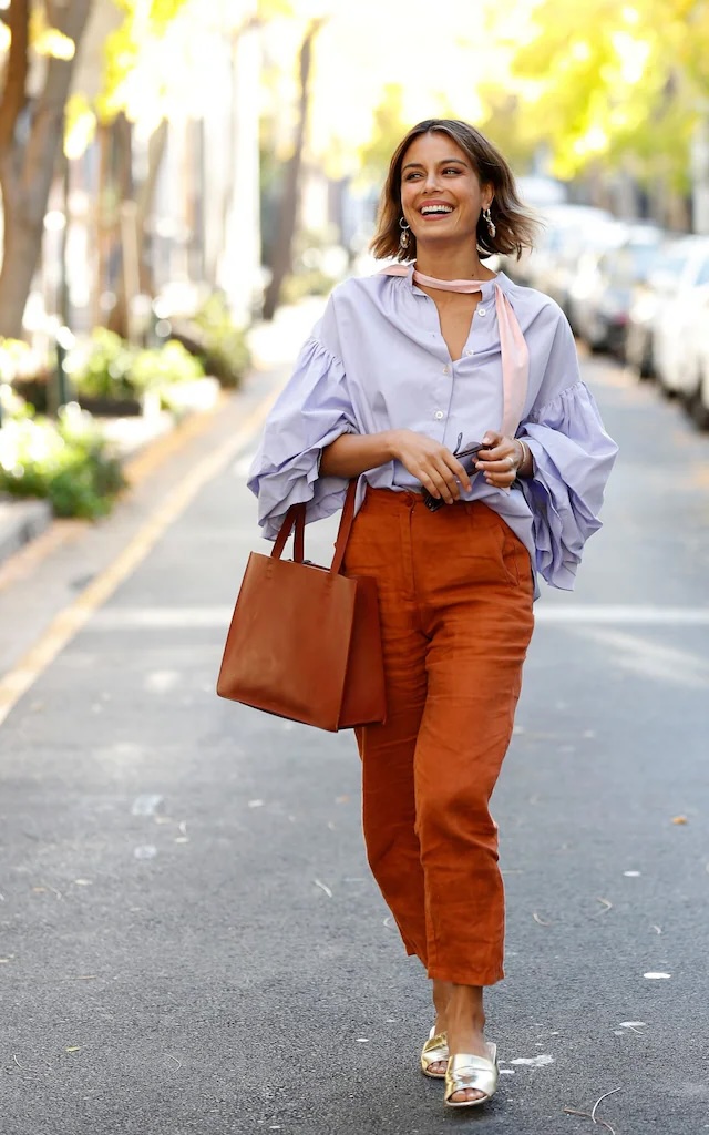 Terracotta trousers with lavender ruffled blouse, autumn in Lisbon